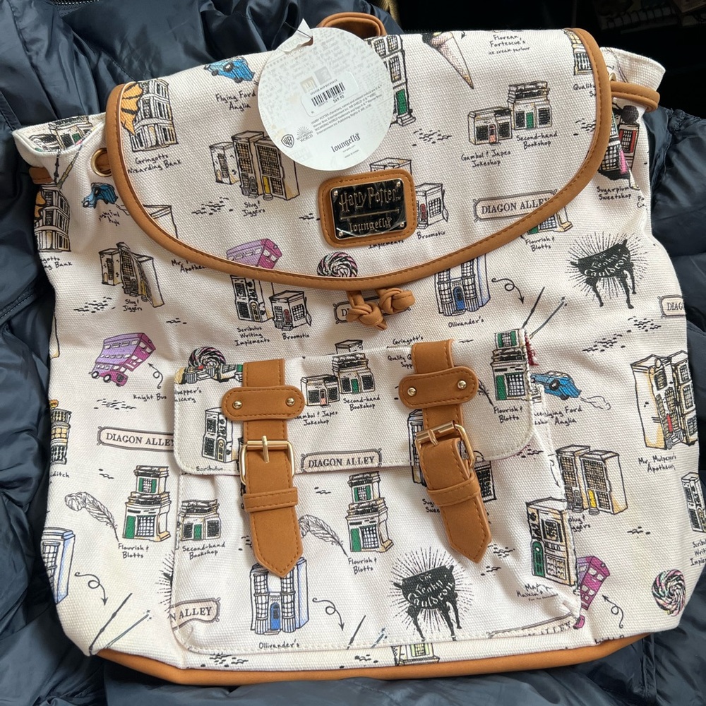 NWT Loungefly Harry Potter Diagon Alley Canvas Rucksack
- BoxLunch Exclusive